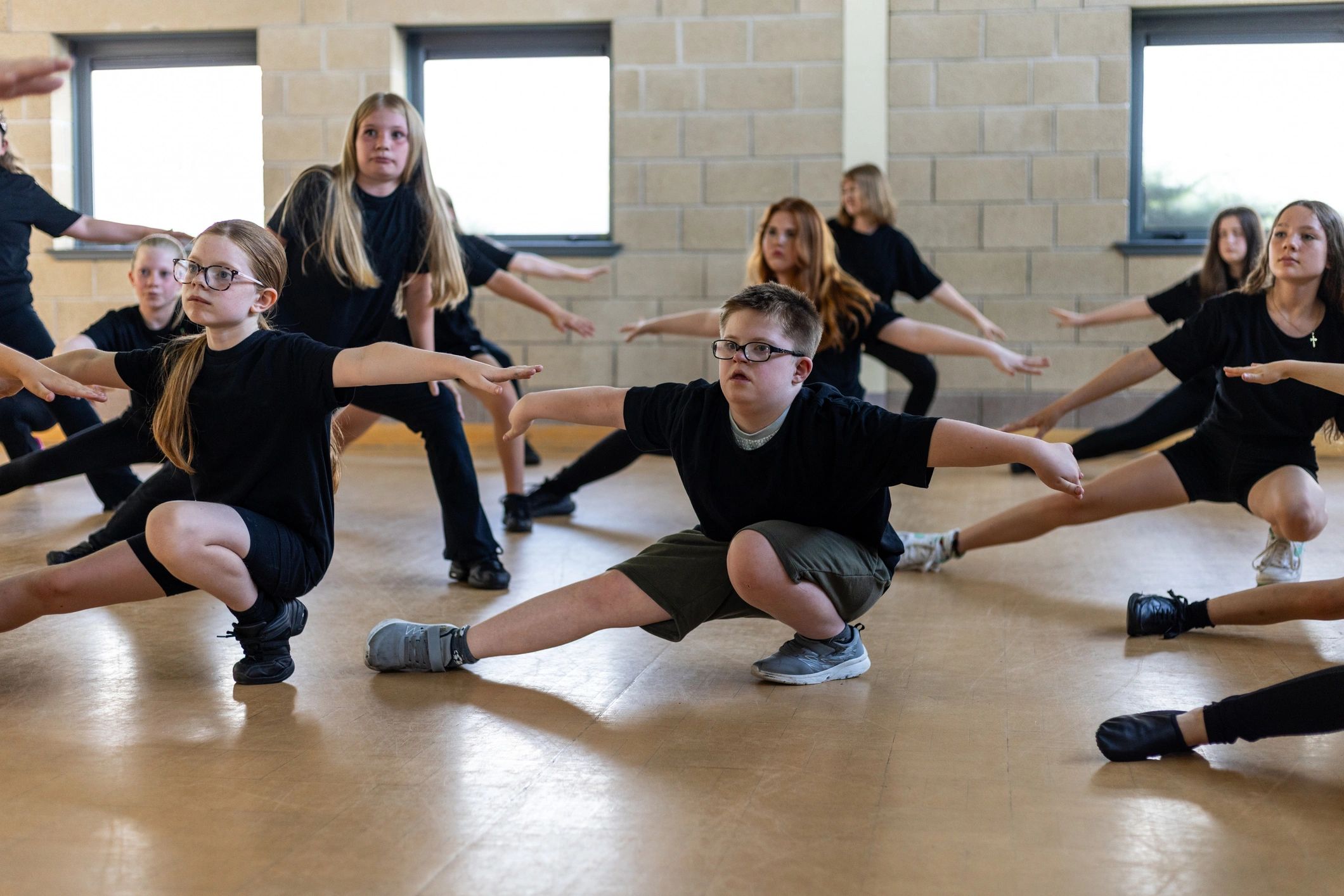 Group fitness class warming up together